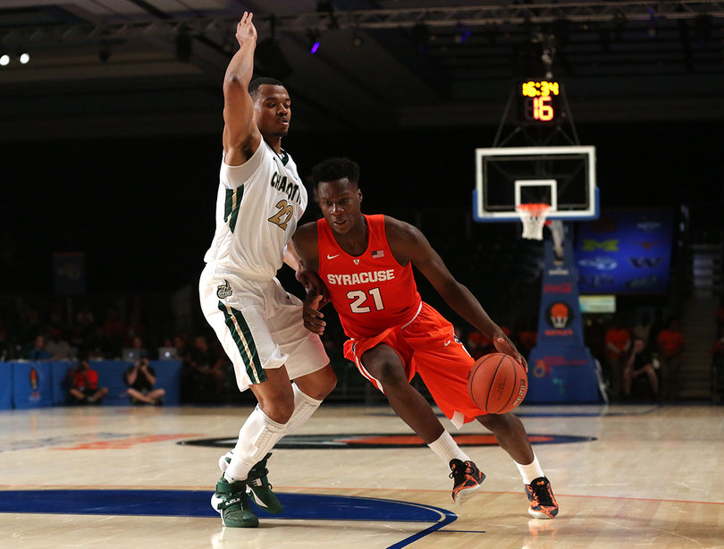 Tyler Roberson attacks the hoop with Charlotte's Bernard Sullivan defending him. Roberson finished with six points and 11 rebounds.