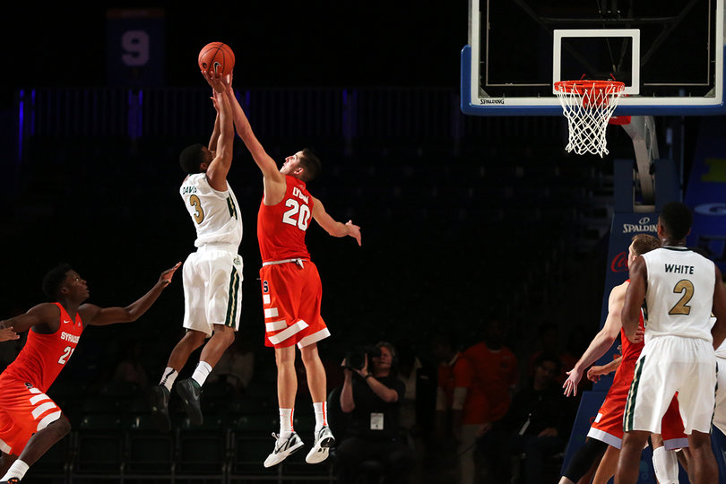 Tyler Lydon blocks a Charlotte player in the second half.