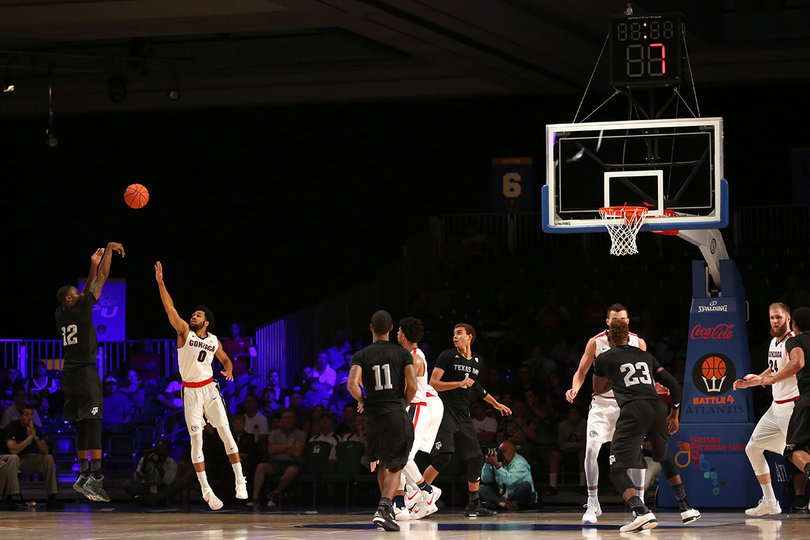 Aggies guard Jalen Jones fires a jump shot over Melson as the shot clock winds down. Jones shot just 2-for-10 in Texas A&M's win. 