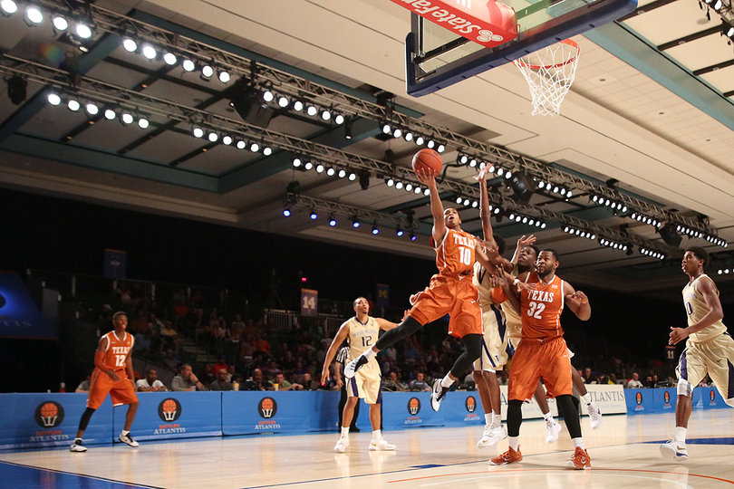 Guard Eric Davis Jr. (10) throws up a contested layup during Texas' 12-point win. Davis led the Longhorns with 15 points. 