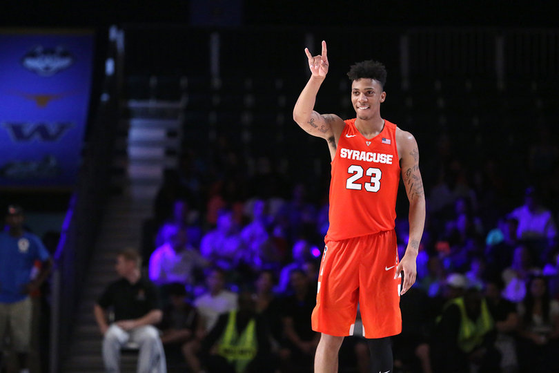 Richardson excitedly gestures with his hand toward the end of the game. Syracuse won 74-67.