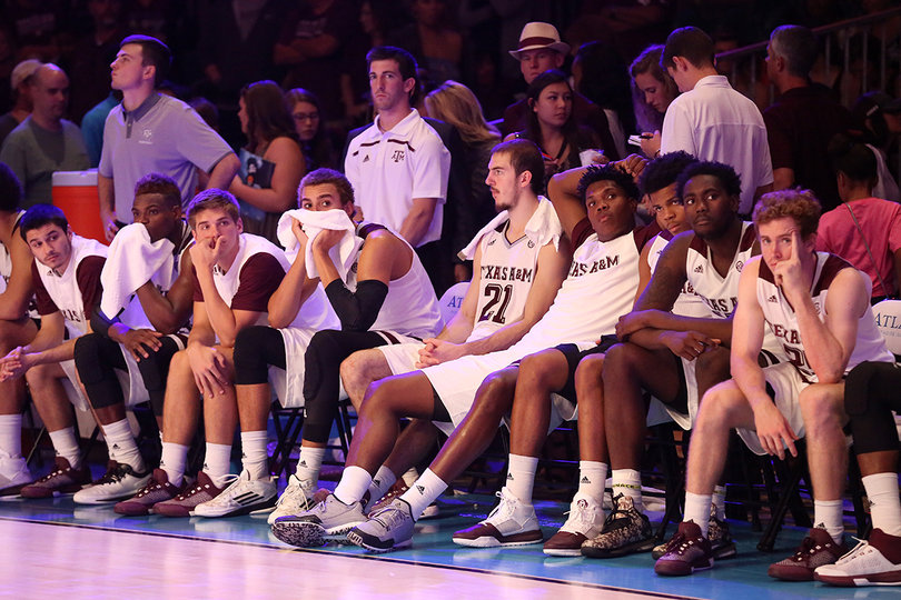 Players on Texas A&M's bench sit dejected after the game ended.