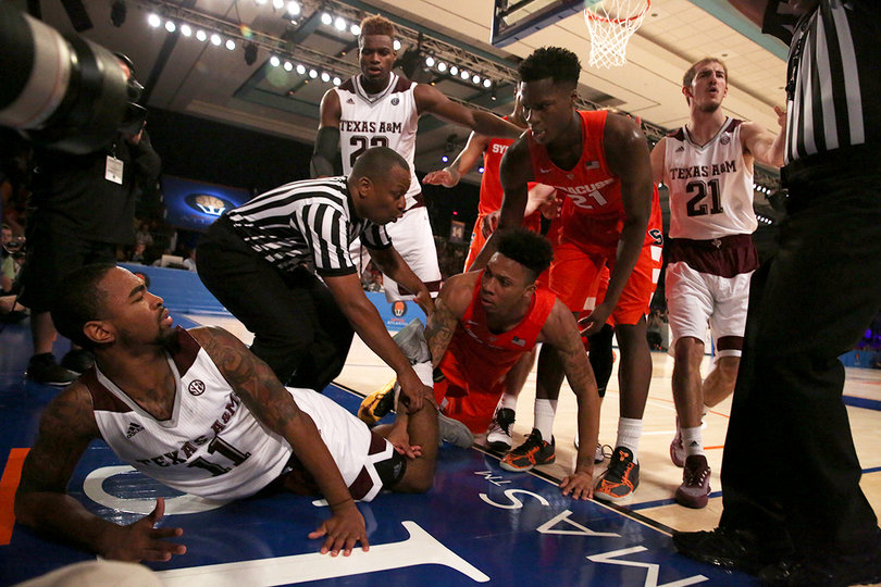 Richardson stares down Collins after a hard foul.