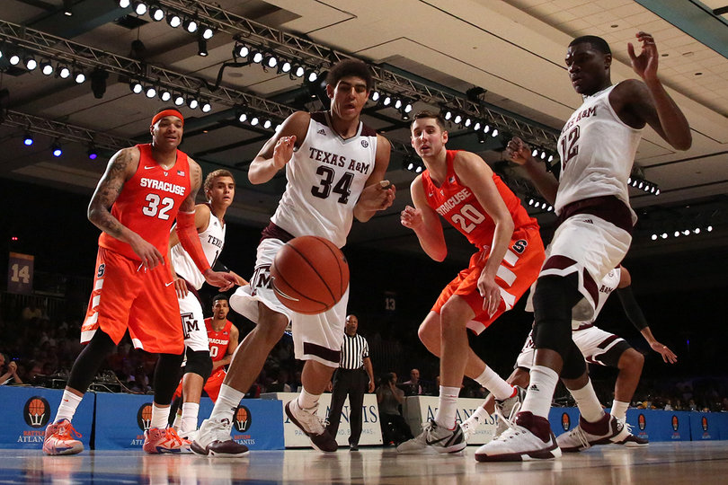 Lydon and Coleman watch the ball go out of bounds.