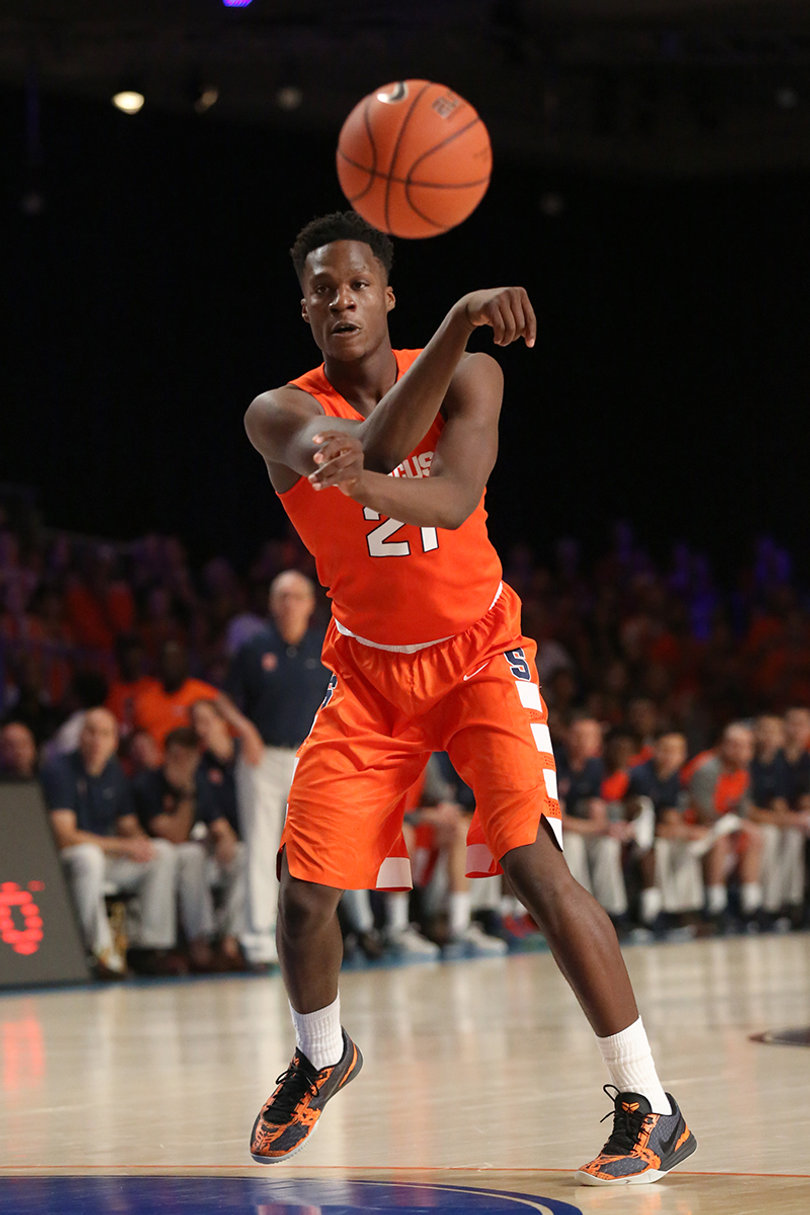 Roberson throws a pass to a teammate. The forward is averaging more rebounds (10.6) than points (9.2) this season.
