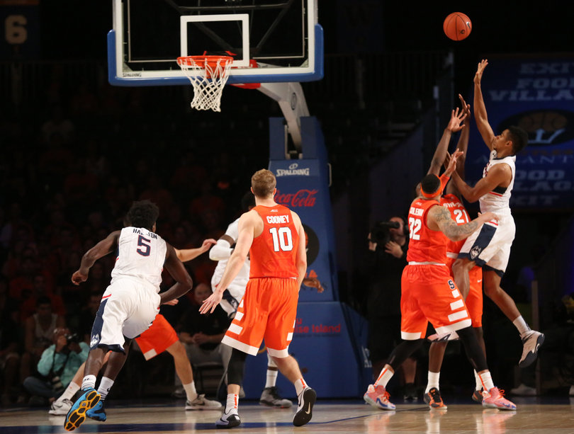Roberson and forward Dajuan Coleman try to prevent a UConn player from floating in a bucket. Coleman scored no points but reeled in eight rebounds. 
