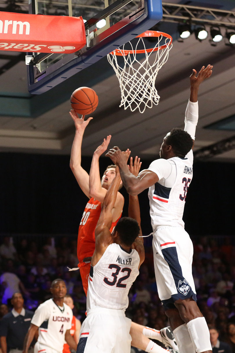 Miller and Brimah try to deny Lydon's layup. Despite scoring 16 points, he shot just 2-for-7 from inside the 3-point arc. 