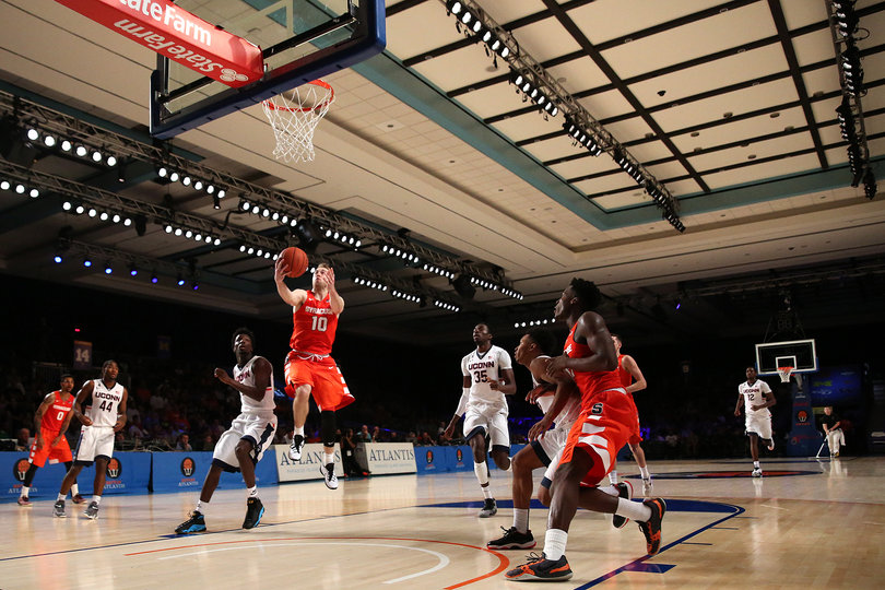 Cooney attempts an open layup agains the Huskies. The Syracuse guard has scored 36 points in the Bahamas, good for second on the team. 