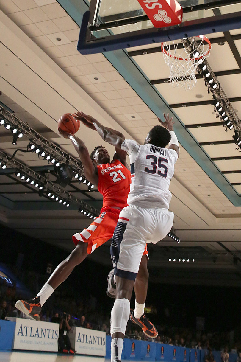 7-foot center Amida Brimah (35) challenges Roberson at the rim. Roberson scored 14 points and grabbed nine rebounds, just nearly missing a double-double. 