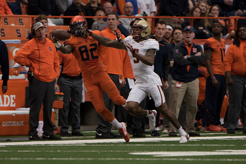 Wide receiver Alvin Cornelius reaches out to catch a Zack Mahoney pass in the first half.