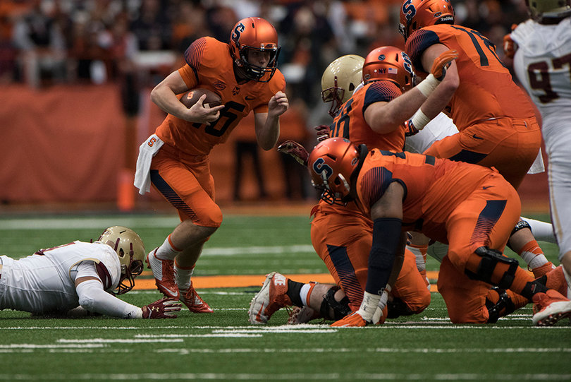 Mahoney tucks the ball to run on the Boston College defense. 