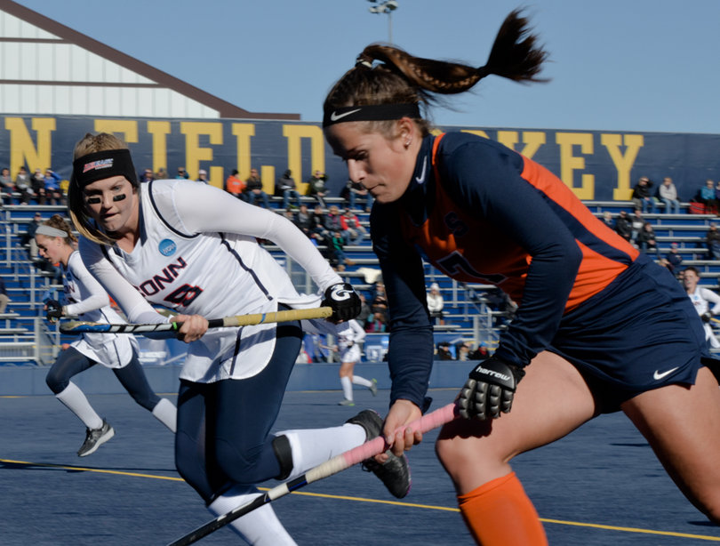 Alma Fenne, who had two goals Friday, puts her head down to advance past Connecticut's Anna Middendorf.