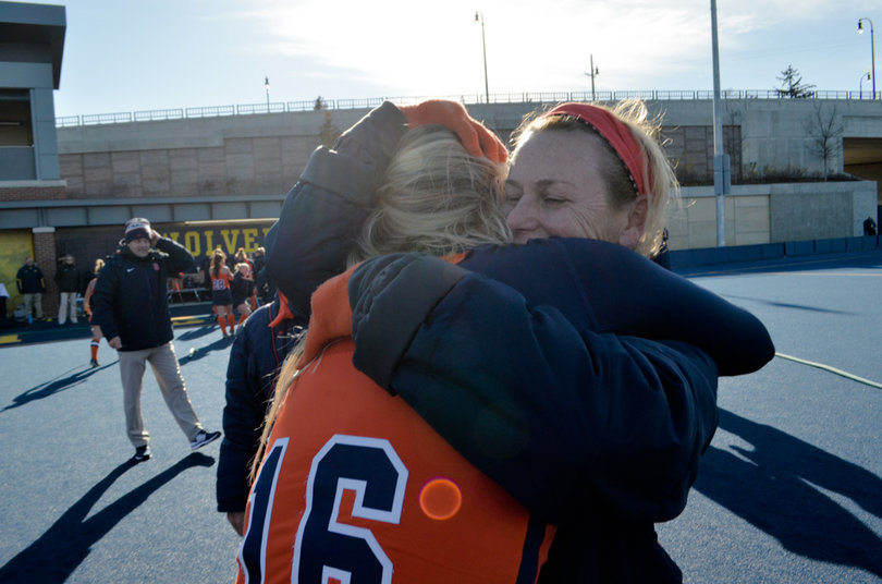 Head coach Ange Bradley embraces freshman back Roos Weers.