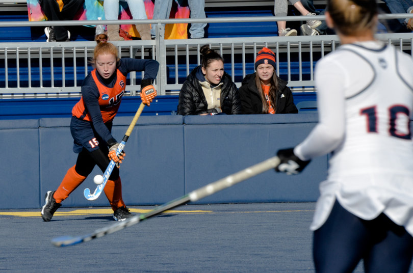 Back Zoe Wilson pushes the ball up the field for Syracuse after intercepting a Connecticut pass.