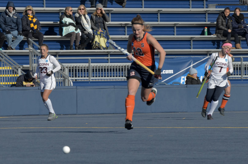 Emma Russell, Syracuse senior captain and program's leading goal-scorer, pursues a long-hit by the Orange.