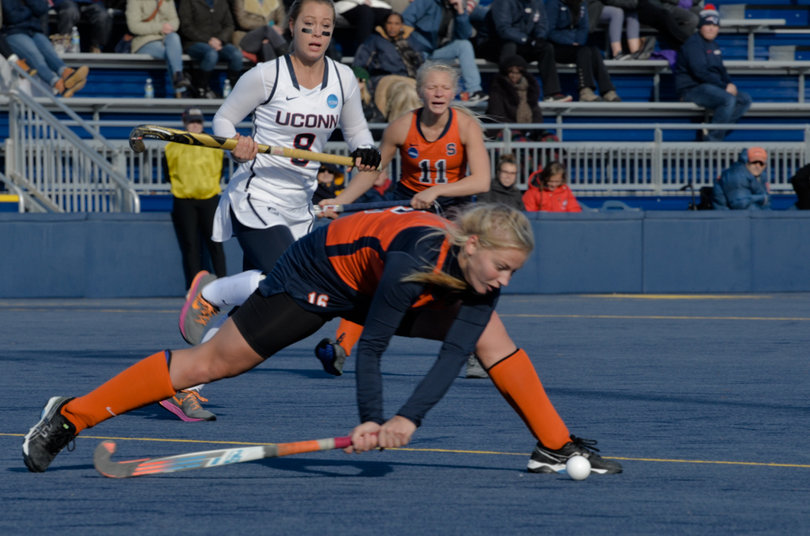 Roos Weers uses her powerful long-hit to clear the ball from Syracuse's defensive zone.