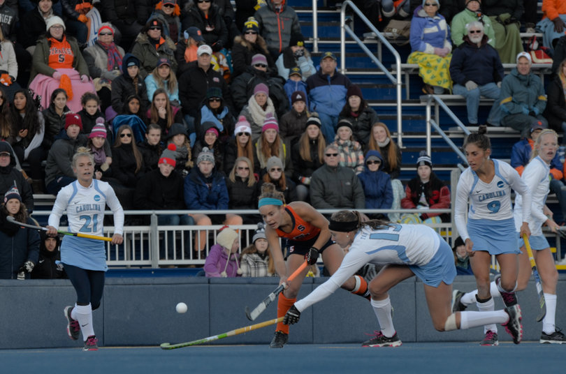 Manley tries to thread a pass over the stick of Malin Evert.