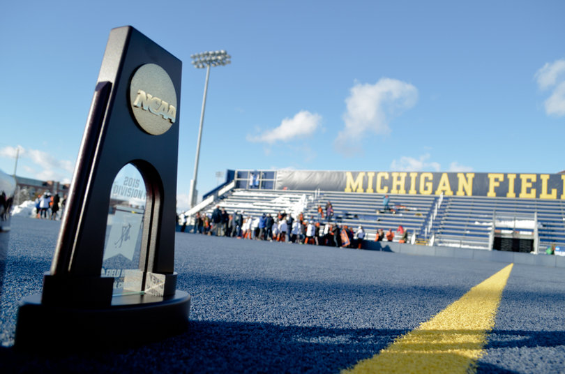 The NCAA title trophy sits on the Ocker Field turf before the game.