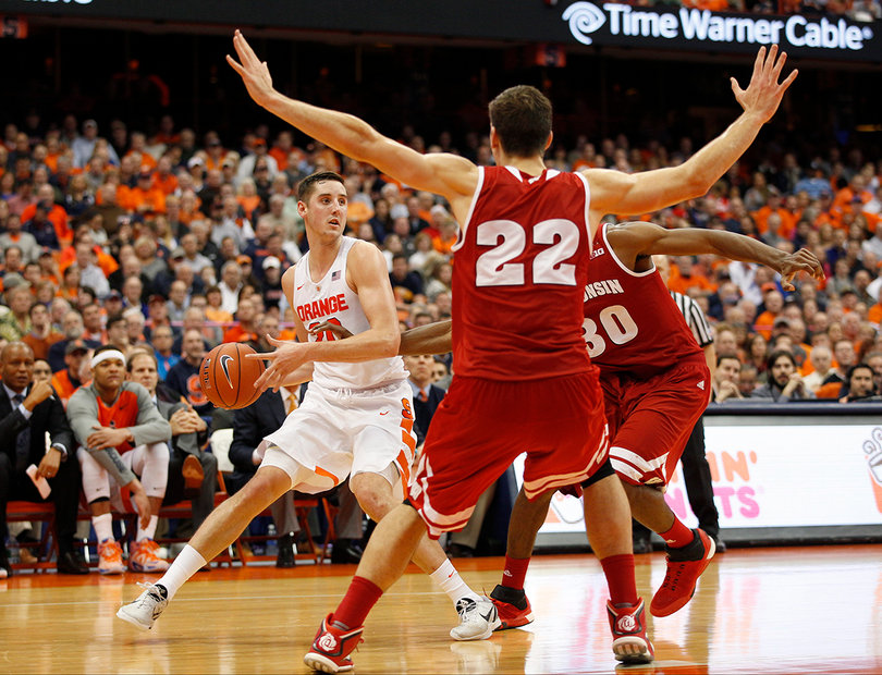 Lydon tries to work the ball out of a double-team by Brown and Wisconsin forward Ethan Happ. 