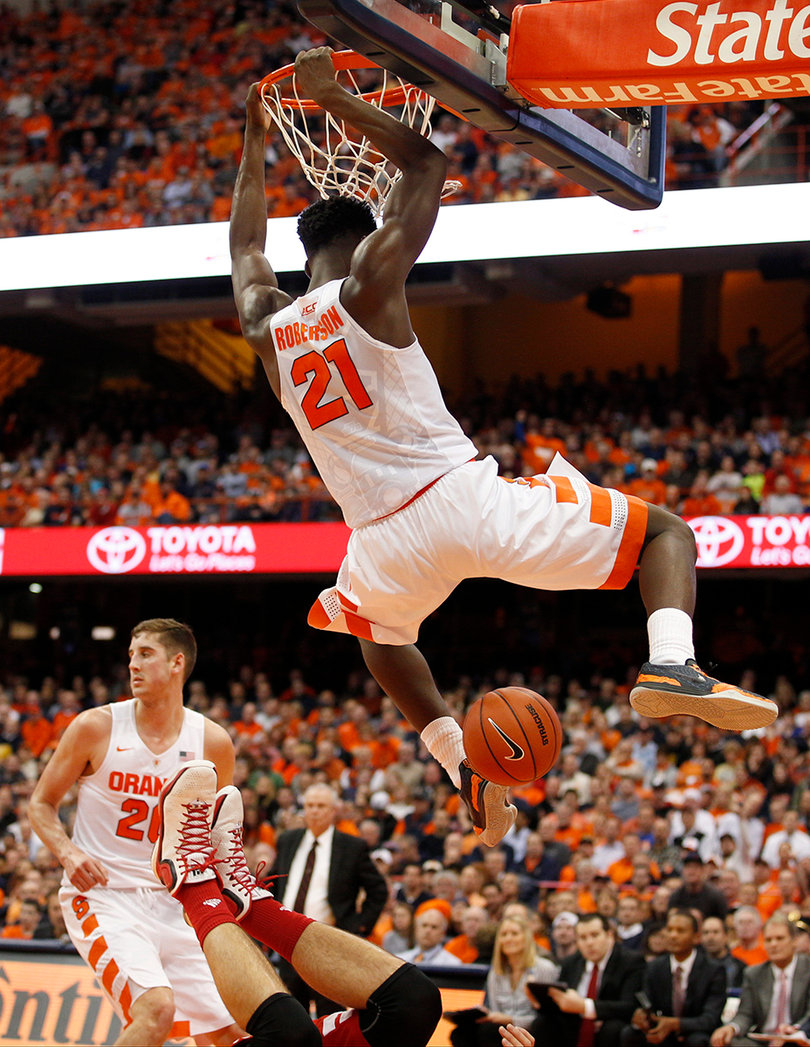 SU forward Tyler Roberson dunks against Wisconsin in the Orange's Big Ten-ACC challenge. 