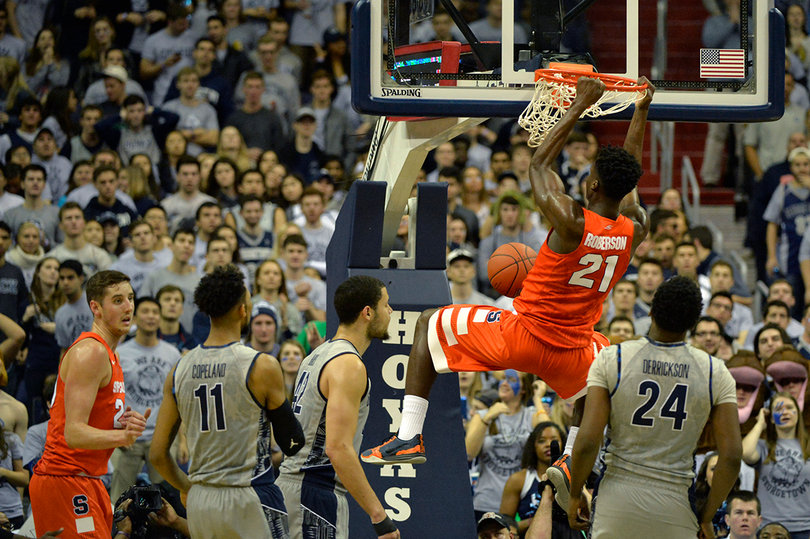 SU forward Tyler Roberson throws down a dunk. He had 15 points, the second most for the Orange on Saturday. 