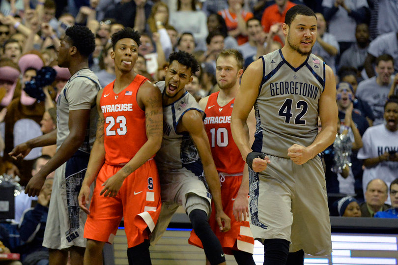 Hayes (42) celebrates after he hit a shot. The Hoyas big man scored 21 points and cleaned up eight rebounds. 