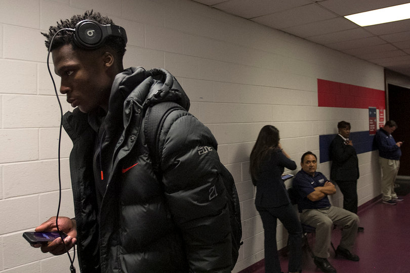 Roberson leaves the locker room with his Beats headphones on after Syracuse's 79-72 loss. 