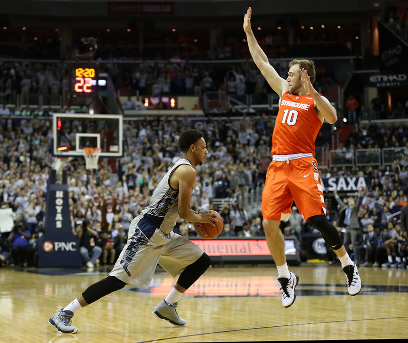 Cooney falls for Cameron's a pump fake. Cameron scored nine points against SU.  