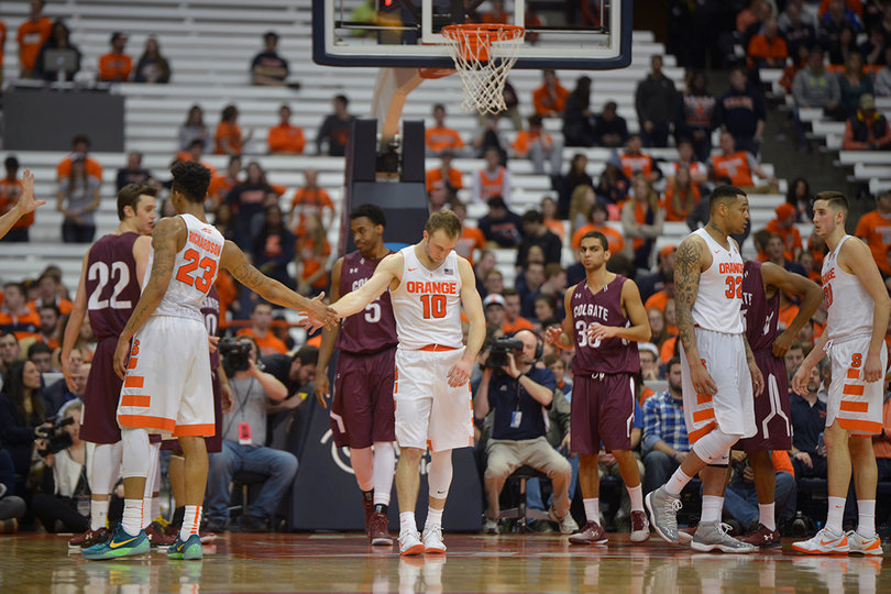 Cooney and Richardson slap high-five during a stop in action.