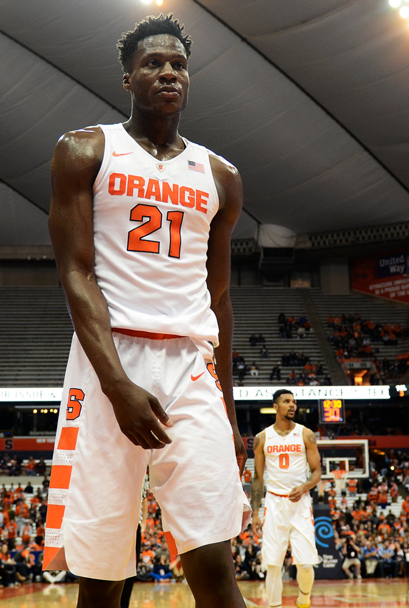 Tyler Roberson stands near the sideline on Tuesday night. He finished with seven rebounds.