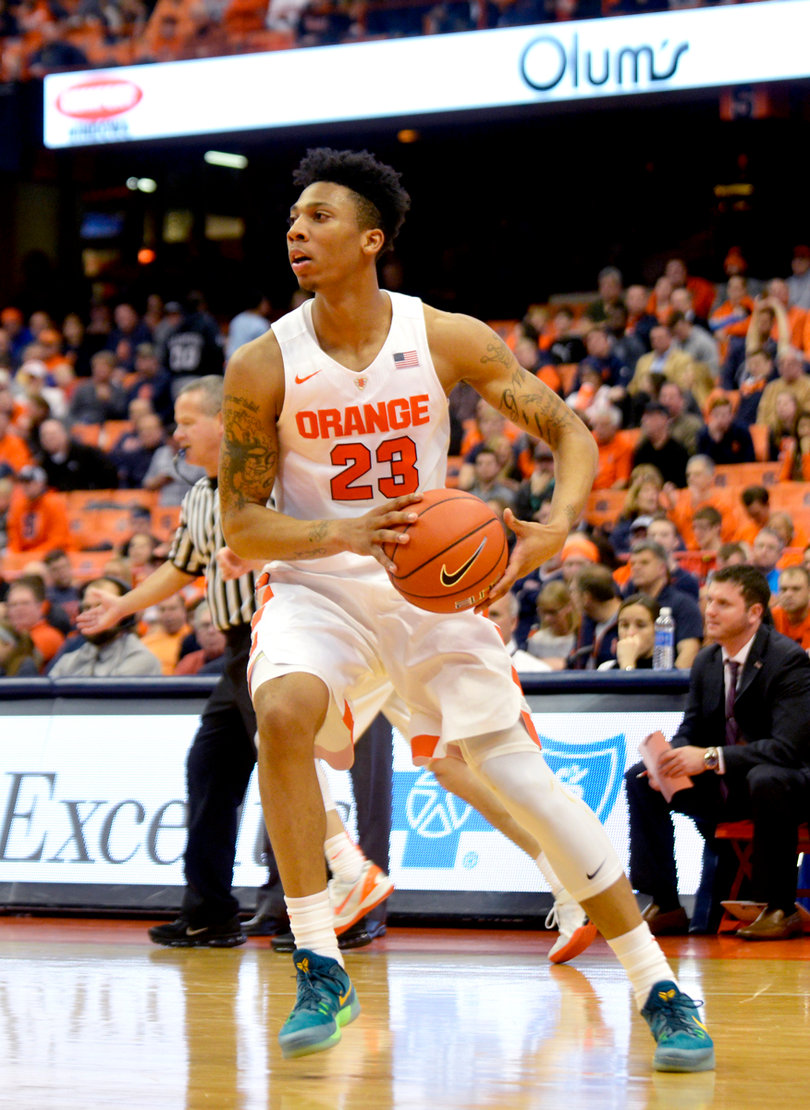 Malachi Richardson protects the ball in space. He tied for a game-high 17 points.