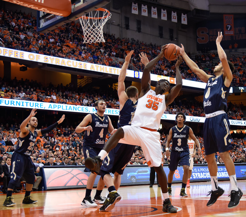 Chinonso Obokoh hauls in a rebound against Montana State. He had a career game with 11 points.