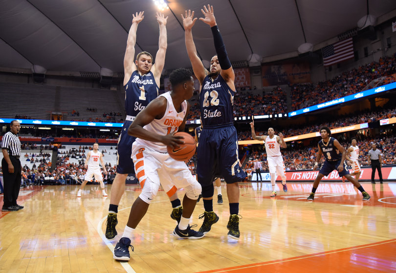 Kaleb Joseph faces a double team in the corner. The sophomore point guard finished with two points in 13 minutes.