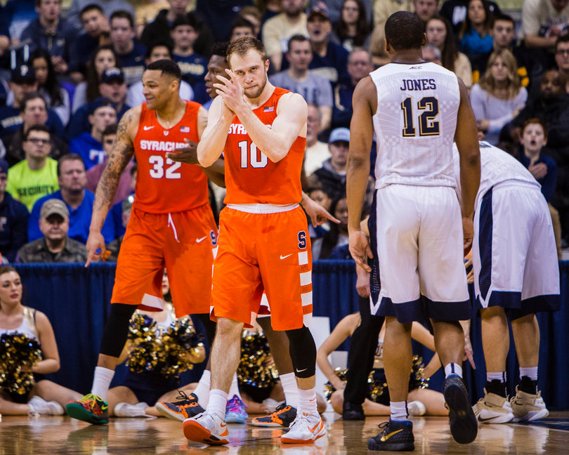 Cooney claps while walking away from the basket. He's been successful from behind the arc recently after snapping an 0-for-11 3-point streak earlier this season.