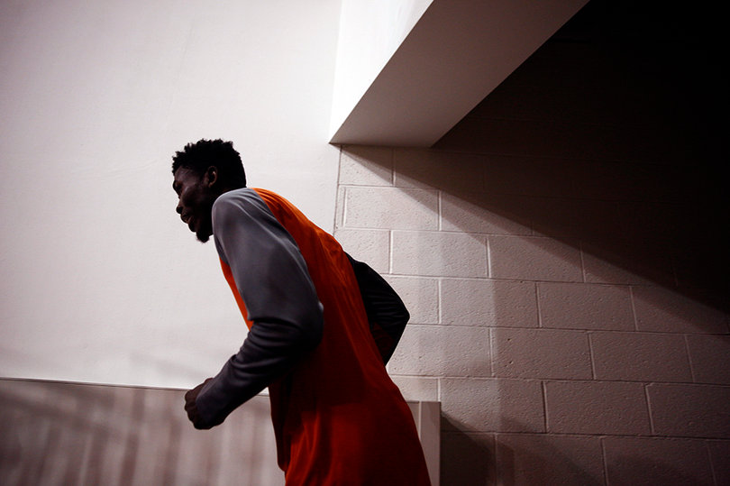 Chinonso Obokoh runs back through the tunnel at the Petersen Events Center. After scoring a career-high 11 points against Montana State, Obokoh has played fewer than five minutes in the last two games. 