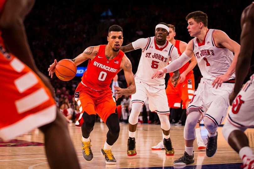 Gbinije attacks the rim with his eyes up. He shot 7-of-11 from the field.