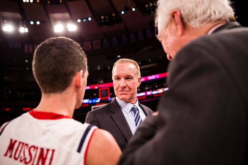 Mullin looks at Federico Mussini, who scored 17 points for SJU.