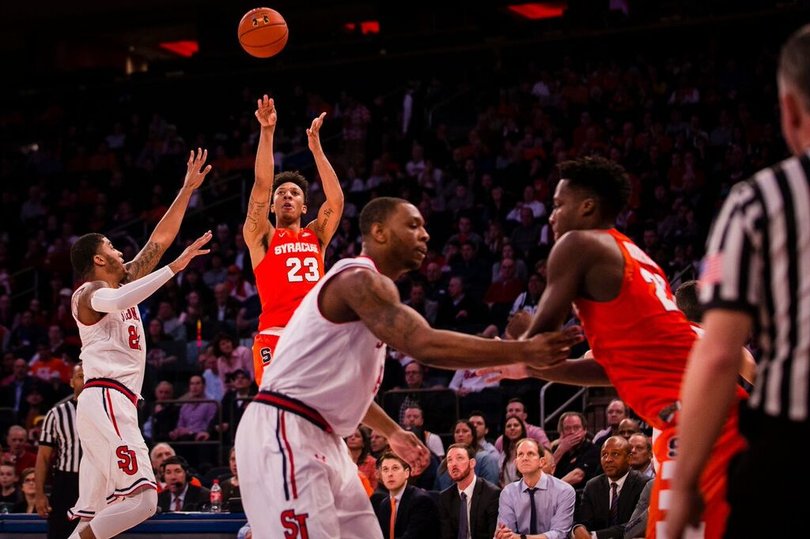 Richardson shoots one of his 11 3s on the day with a defender in front of him.