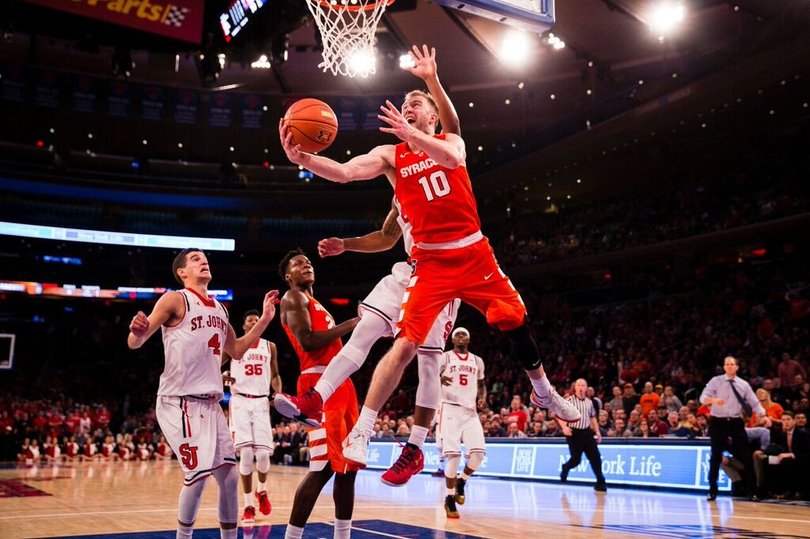 Cooney puts up a contested underhand layup. He scored 11 points but went 1-of-8 from 3.