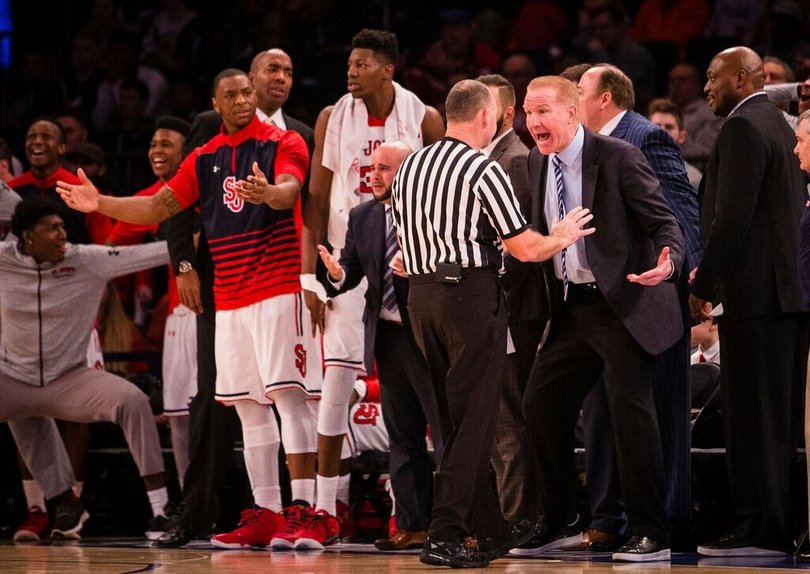 St. John's head coach Chris Mullin complains to a ref.