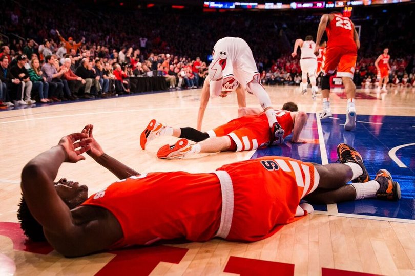 Roberson lay flat on the ground as St. John's heads back down the court in the opposite direction.