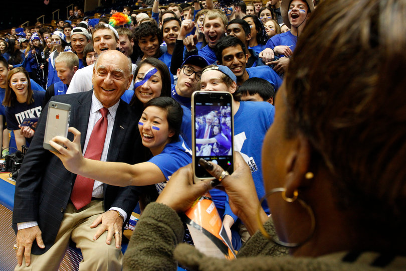 Jamie Park, a junior psychology major, takes a selfie with ESPN analyst Dick Vitale.