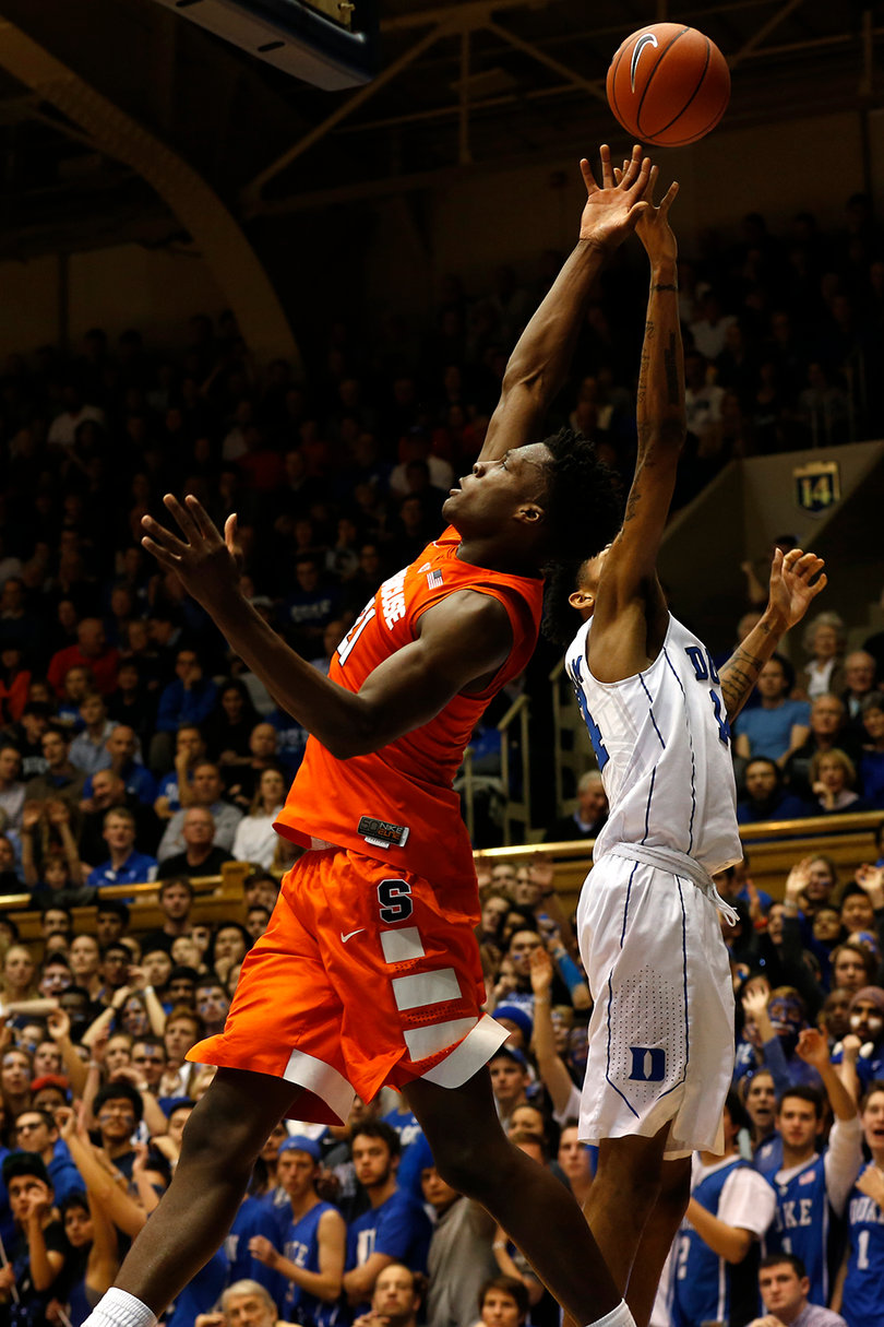 Roberson extends his right arm into the air to try and corral the ball. He picked up a double-double for the third consecutive game.