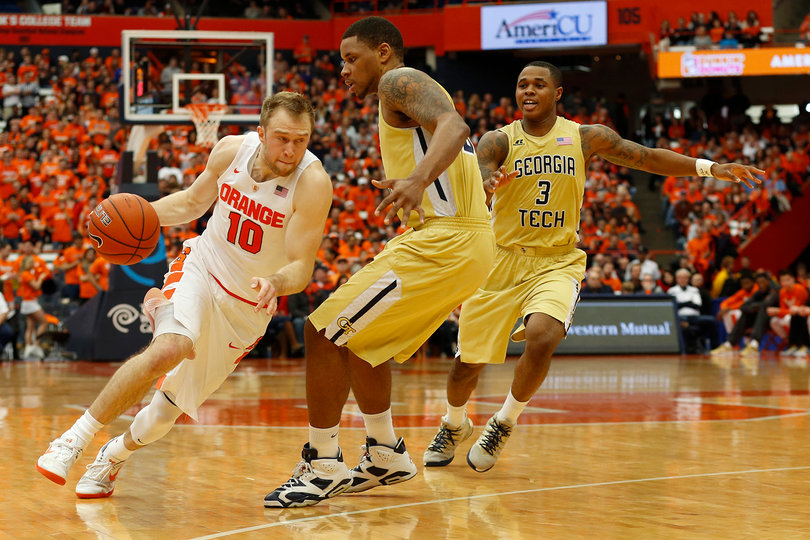 Trevor Cooney drives from the perimeter against Georgia Tech.