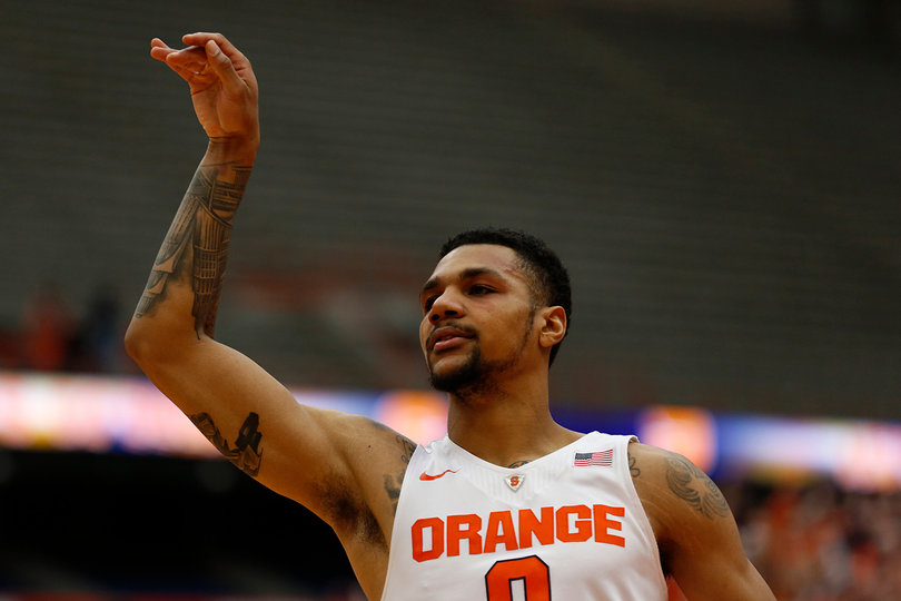 Gbinije follows through on a shot at the Carrier Dome at Syracuse. He shot 5-of-10 from the field. 