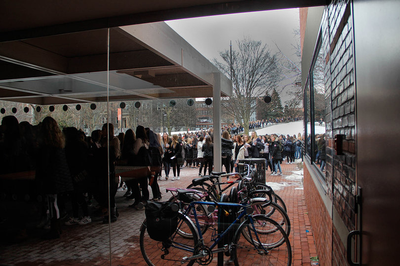Potential new sorority members enter Schine Student Center on Sunday prior to receiving their bids.