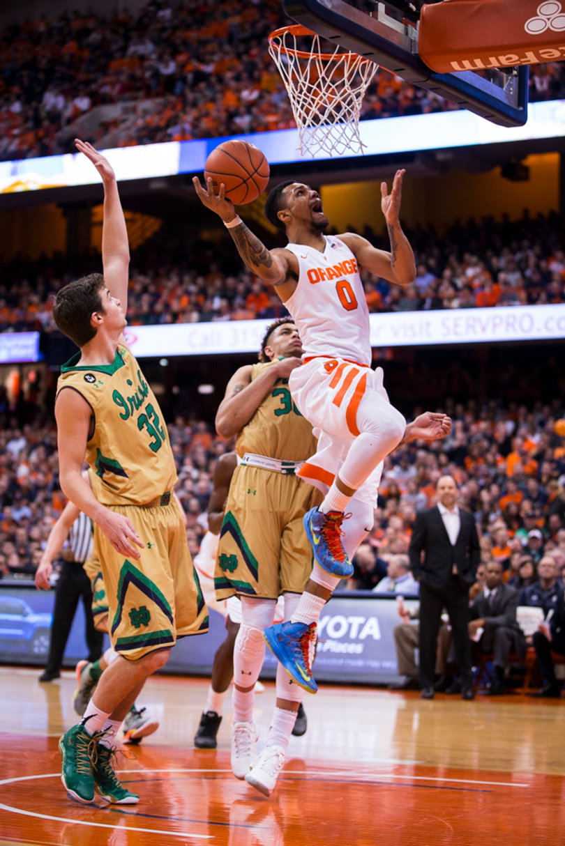 Michael Gbinije scored 15 points and dished 5 points in Syracuse's 81-66 upset of No. 25 UND. 