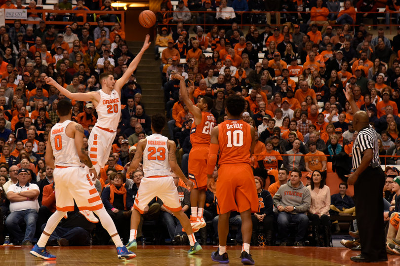 Tyler Lydon (20) goes up and contests a shot by Clemson guard Jordan Roper. Lydon ended up with a game-high five steals. 