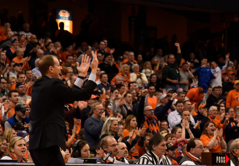 Interim Syracuse head coach Mike Hopkins waves his hands in the air. It was his last game as interim head coach as Jim Boeheim will return from his NCAA-sanctioned nine-game suspension for SU's next game