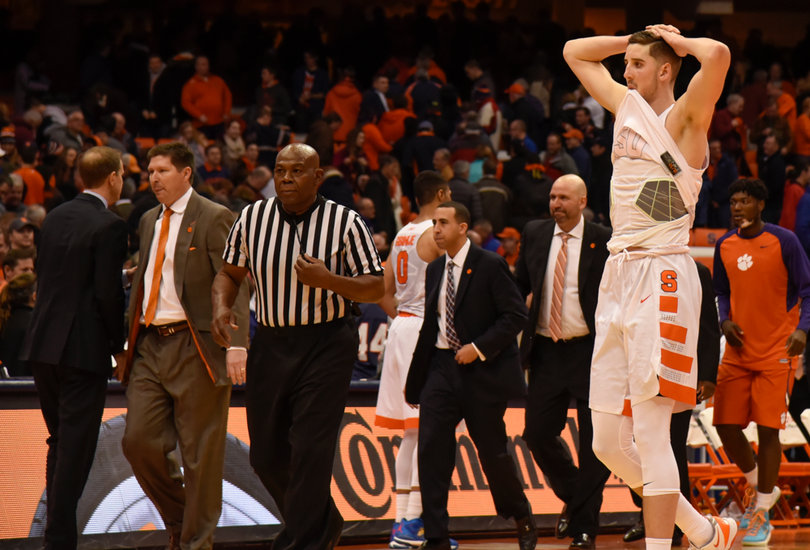 Lydon holds his hands on his head while biting his jersey after Syracuse lost by one point in overtime. The Orange dropped to 0-3 in ACC play with the loss.
